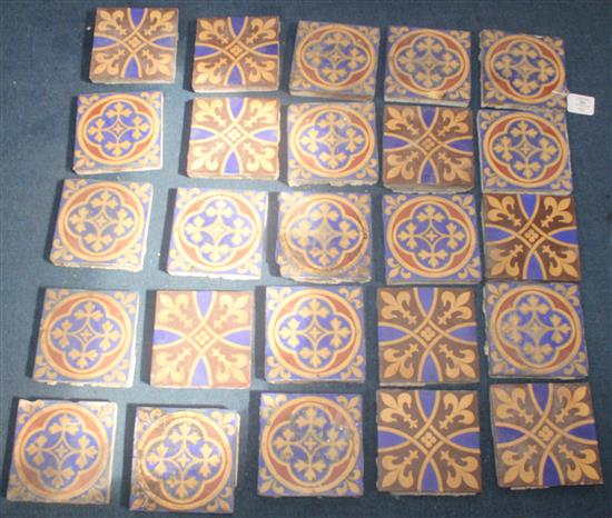 Twenty five Minton & Co encaustic floor tiles, 19th century, 15cm sq., old mortar